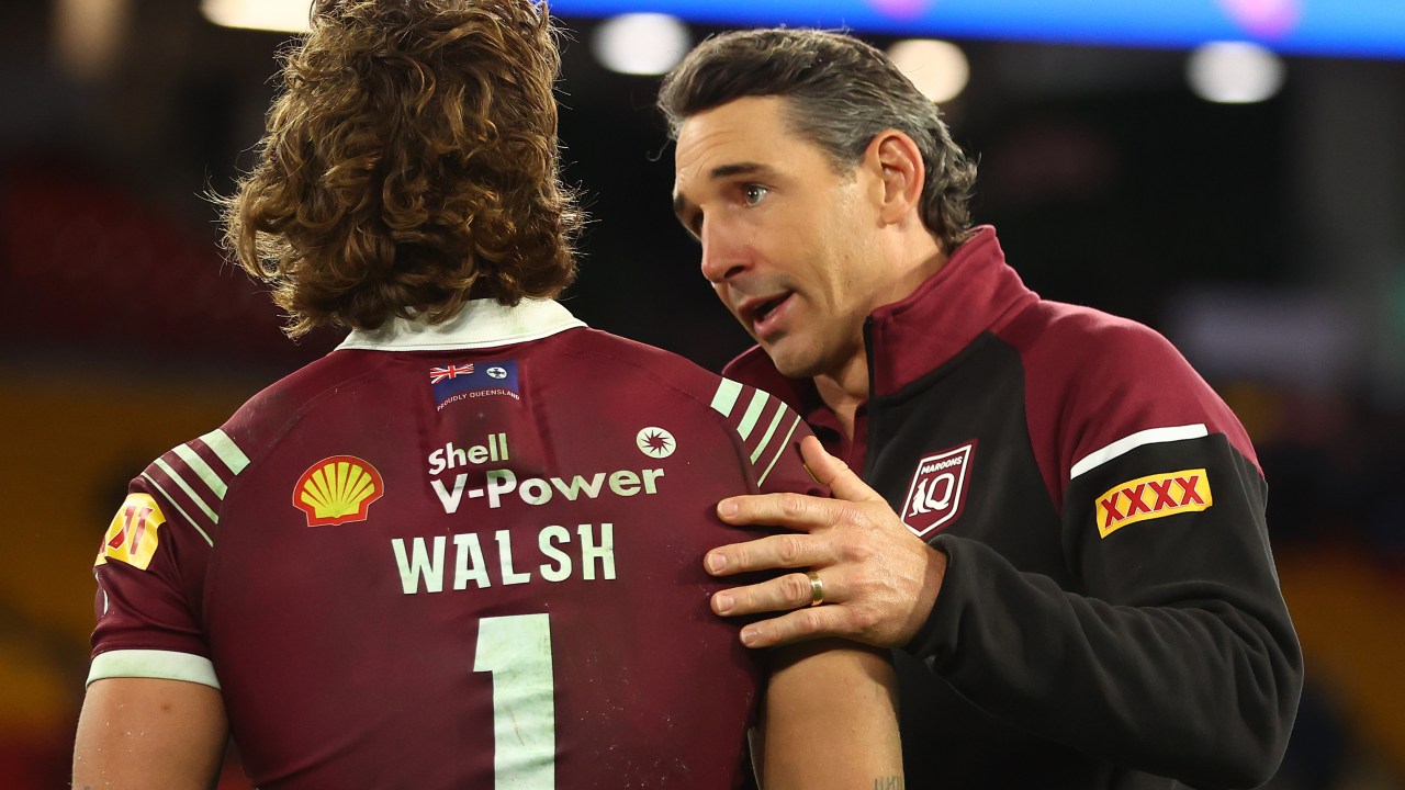 Maroons coach Billy Slater speaks with Walsh. Photo by Chris Hyde/Getty Images