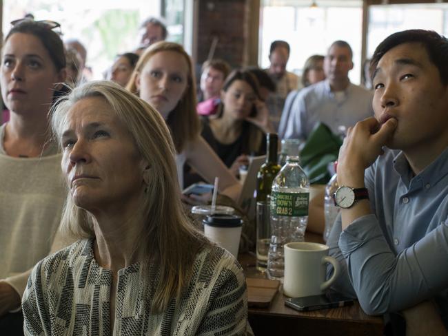 Crowds at Brooklyn cafe Building on Bond look on. Picture: AP/Mary Altaffer