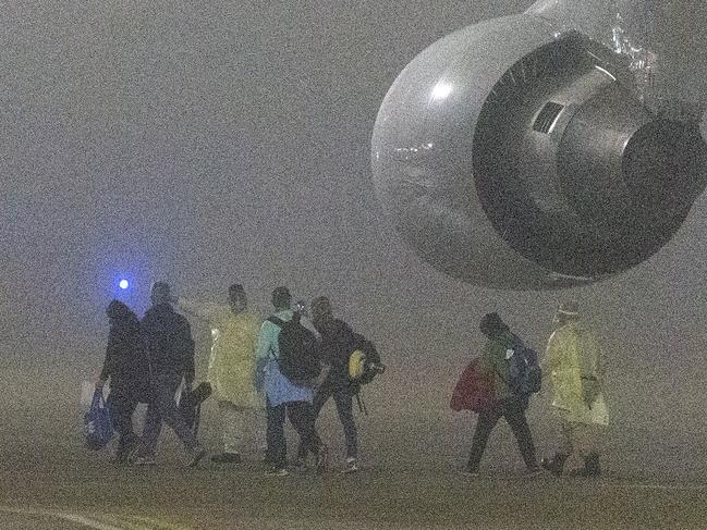 American passengers evacuated from the ship arrive in Texas. Picture: AP