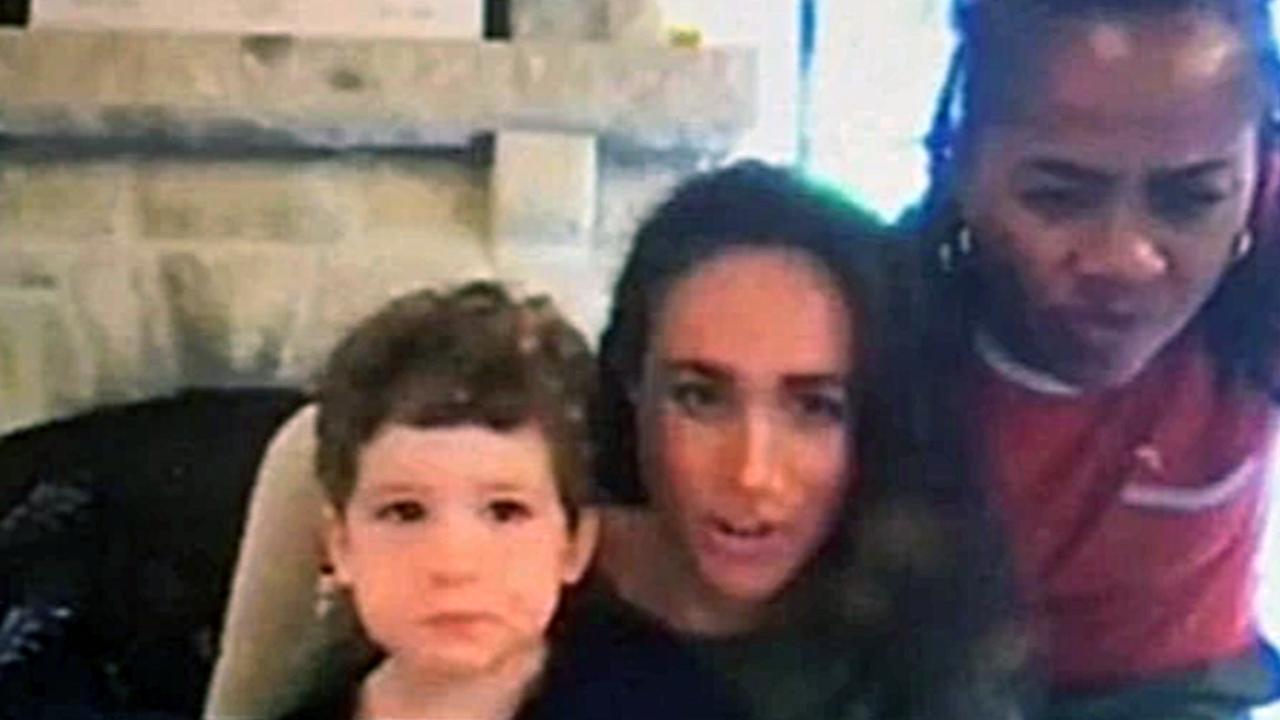 Archie sits on his mum’s lap during a video chat alongside Meghan’s mother Doria Ragland. Picture: Twitter