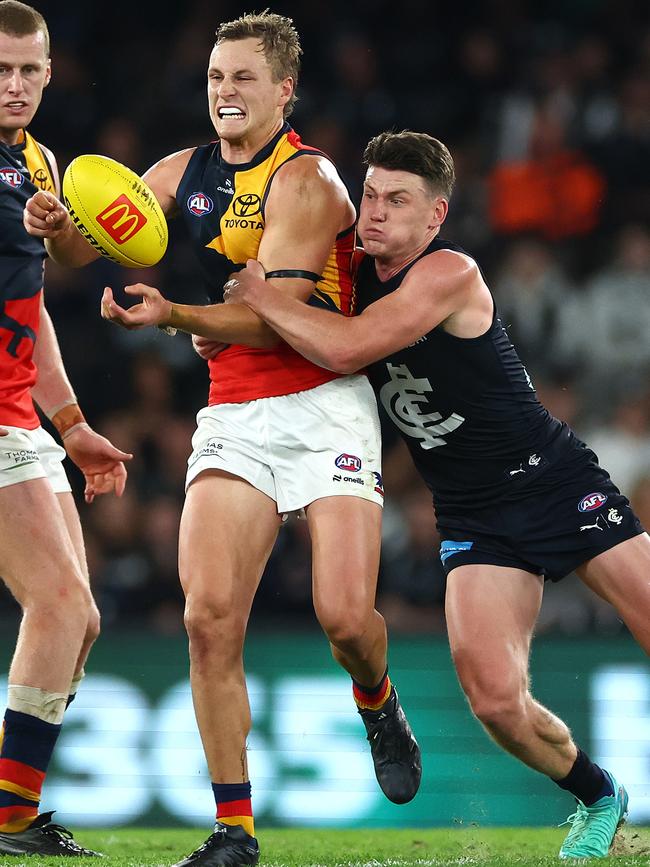 Sam Walsh tackles Jordan Dawson. Picture: Quinn Rooney/Getty Images