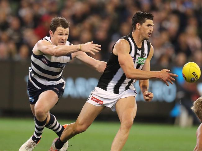 AFL First Qualifying Final.  06/09/2019 . Geelong vs Collingwood at the MCG .   Collingwood's Scott Pendlebury  clears infant of Geelong Patrick Dangerfield  2nd quarter    . Pic: Michael Klein.