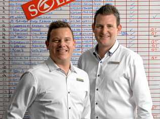 First National Real Estate Action Realty Ipswich business owner Steven Baldwin and principal Glenn Ball have had a record breaking sales month. Picture: Rob Williams