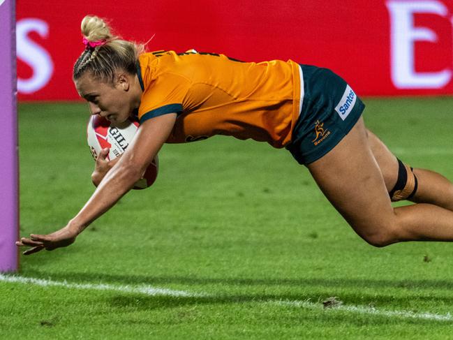 Teagan Levi doing what she does best for Australia - scoring tries. Picture: Getty Images