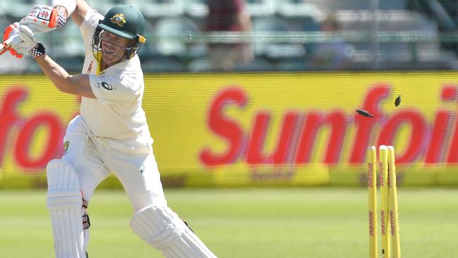 PORT ELIZABETH, SOUTH AFRICA - MARCH 11: David Warner of Australia is bowled by Kagiso Rabada of South Africa during day 3 of the 2nd Sunfoil Test match between South Africa and Australia at St Georges Park on March 11, 2018 in Port Elizabeth, South Africa. (Photo by Ashley Vlotman/Gallo Images/Getty Images)