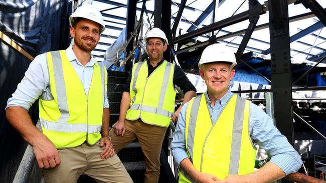 Kelly O'Connell, Philip Hancox, and Paul Callander from Dreamworld at the site of the new ride. Picture: Adam Head