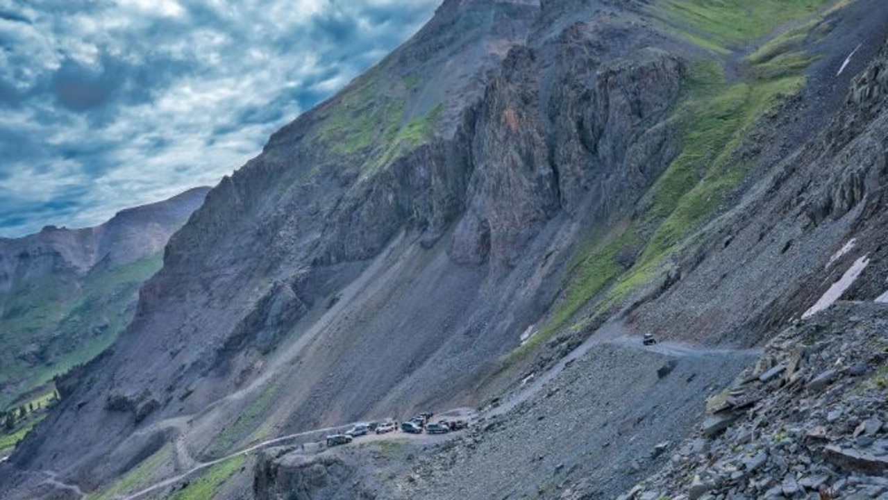 A narrow dirt road leads up to Imogene Pass, which has an elevation of 3,997 metres. Picture: Getty