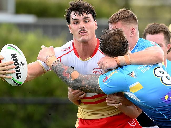 SUNSHINE COAST, AUSTRALIA - FEBRUARY 18: Herbie Farnworth of the Dolphins looks to offload during the NRL Pre-season challenge match between the Dolphins and Gold Coast Titans at Sunshine Coast Stadium on February 18, 2024 in Sunshine Coast, Australia. (Photo by Bradley Kanaris/Getty Images)