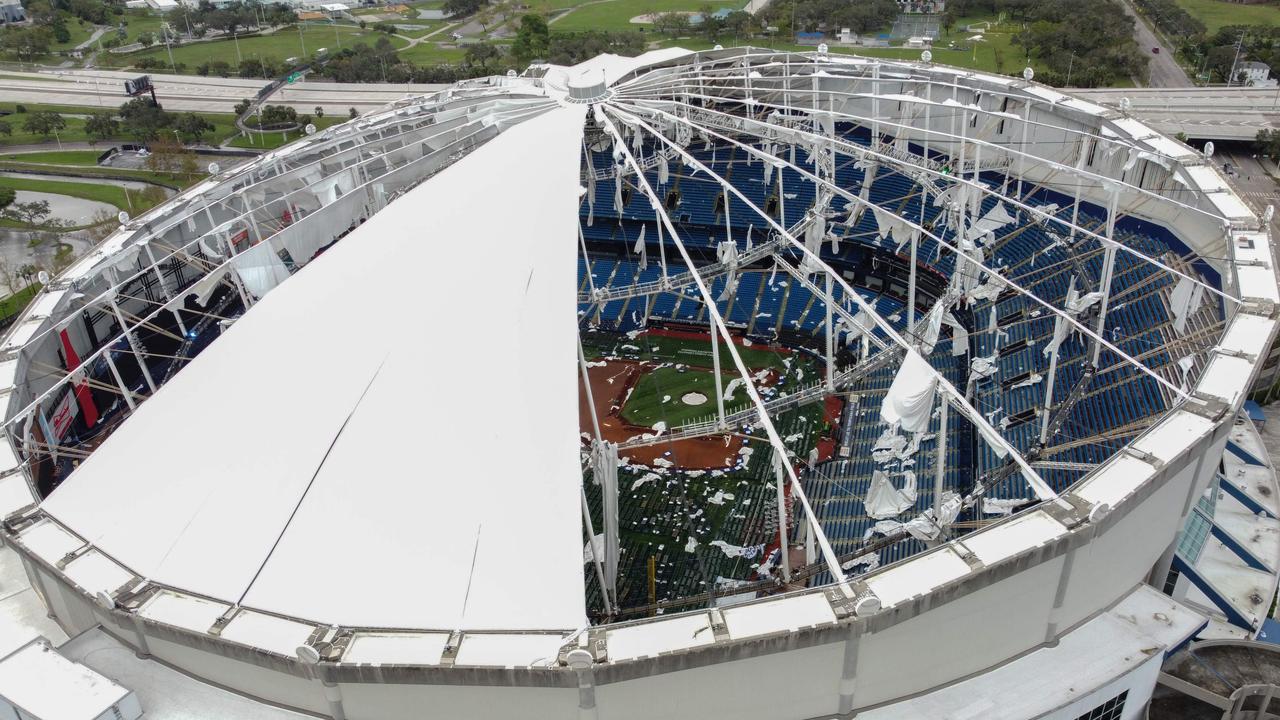 A drone image shows the dome of Tropicana Field which has been torn open due to Hurricane Milton in St. Petersburg, Florida, on October 10, 2024. (Photo by Bryan R. SMITH / AFP)