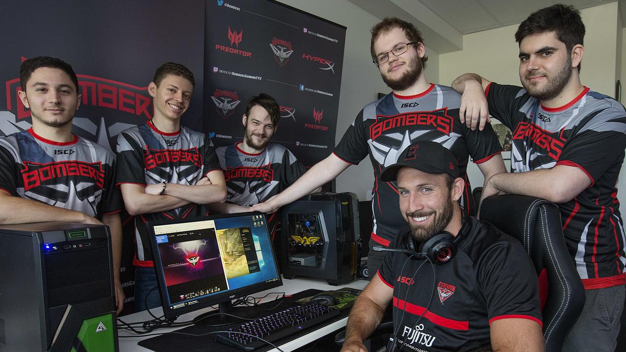 Cale Hooker with the Bombers’ esports team. Picture: Ian Currie