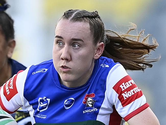 TOWNSVILLE, AUSTRALIA - SEPTEMBER 21: Tamika Upton of the Knights makes a break during the round nine NRLW match between North Queensland Cowboys and Newcastle Knights at Queensland Country Bank Stadium on September 21, 2024 in Townsville, Australia. (Photo by Ian Hitchcock/Getty Images)