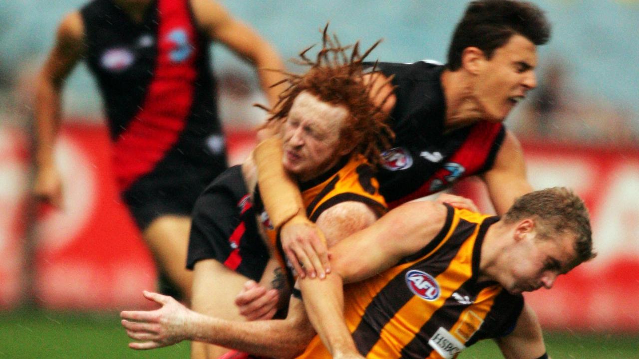 Matthew Lloyd collects Josh Thurgood in 2005.