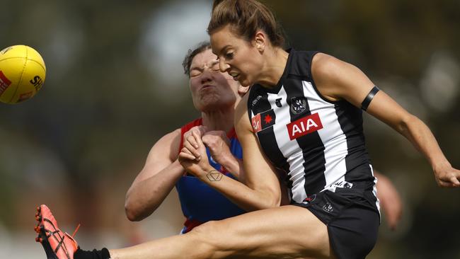 Ellie Blackburn bumps Stephanie Chiocci as she gets her kick agway. Picture: Darrian Traynor/Getty Images