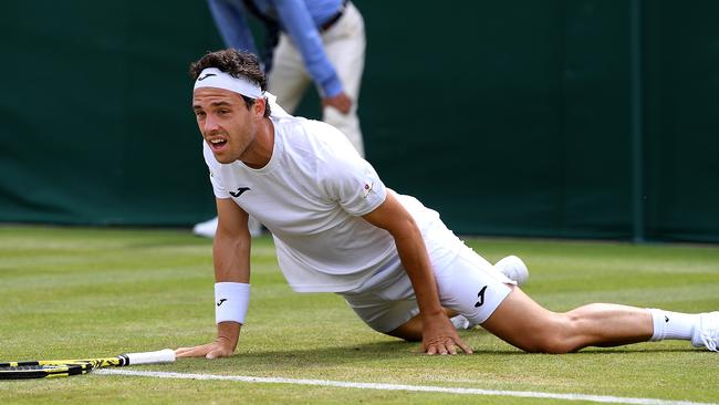 De Minaur left Marco Cecchinato on the floor. Picture: Getty