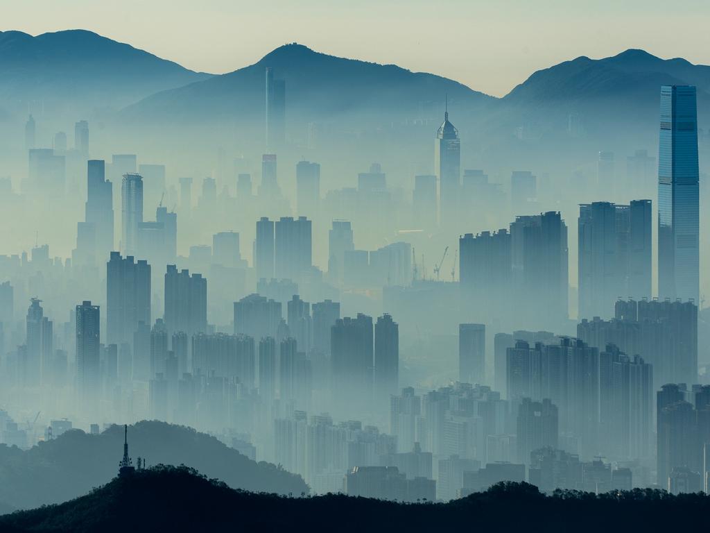 At dawn atop Tai Mo Shan, Hong Kong’s highest point, a sea of fog transforms the cityscape into a surreal tableau of silhouetted skyscrapers. Picture: Siu Hang Andrew Tsang