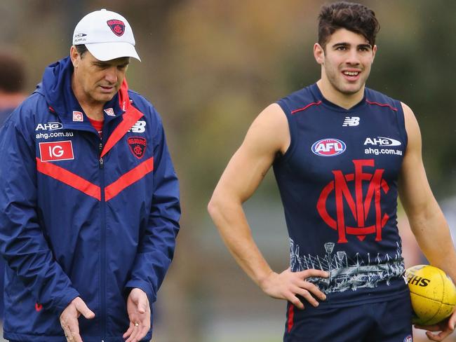 Former coach Paul Roos talks with Christian Petracca. Picture: Getty Images