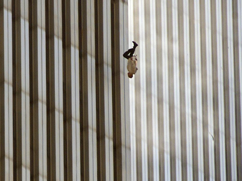 This photo became known as ‘The Falling Man’ – the unknown man falls from the North Tower of the World Trade Centre at 9.41:15am on the morning of the terrorist attacks. Picture: Richard Drew/AP