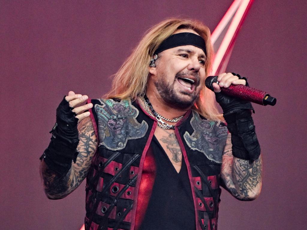 Vince Neil and his band were forced to hide in a dressing room. Picture: Anthony Devlin/Getty Images