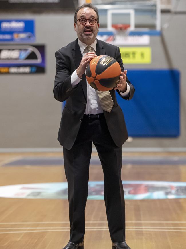 Sports Minister Martin Pakula shoots some baskets at the announcement. Picture: Andy Brownbill