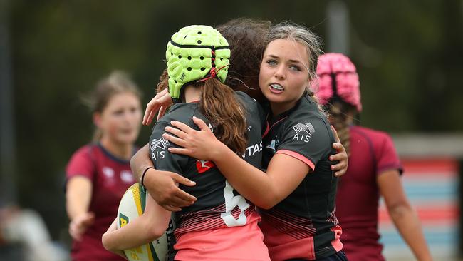 The Barbarians celebrate a try scored by Dominika Baleinagasau.