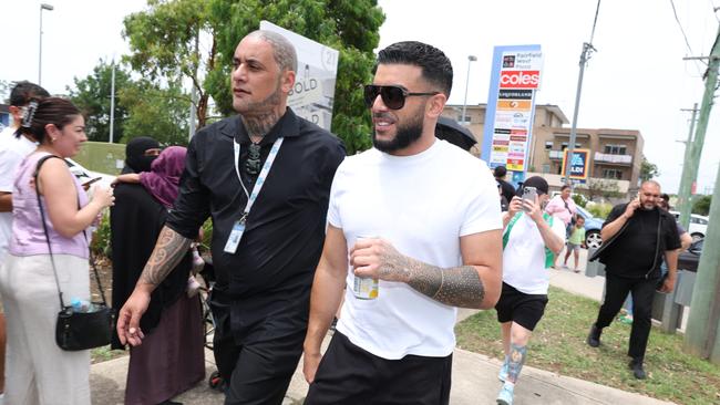 “Lambo Guy” Adrian Portelli arrives at a Coles in Fairfield to give out free groceries on Tuesday. Picture: Rohan Kelly.