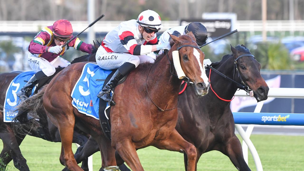 Pinstriped surges past Mr Brightside to win the Group 1 Memsie Stakes at Caulfield. Picture: Pat Scala/Racing Photos via Getty Images