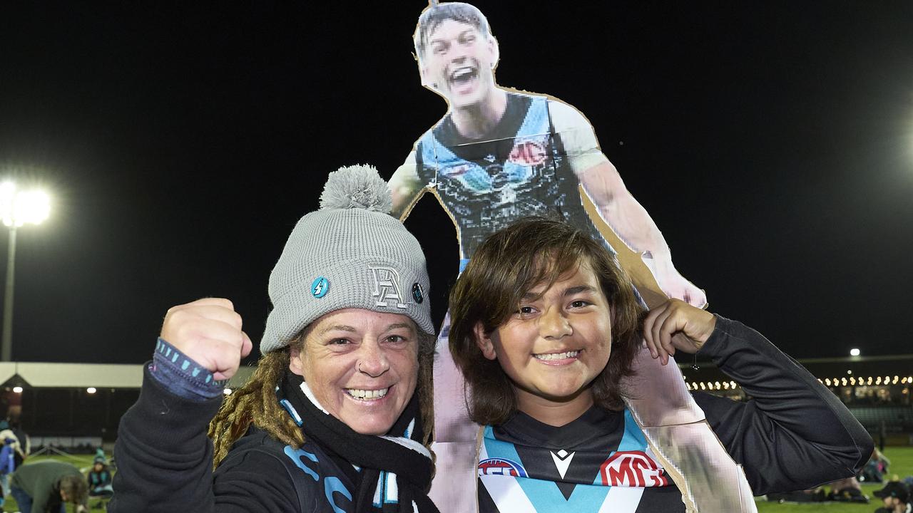 Denim Withnell with her son Tanu Reid, 12 at Alberton Oval, during the Port Adelaide vs Sydney AFL match, Friday, Sept. 20, 2024. Picture: Matt Loxton