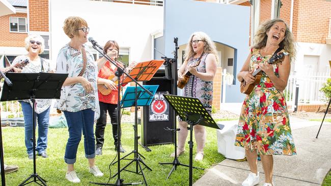 Ukulele group, led by Stephanie Sims from Uko Ono, perform at the reopening ceremony. Photo: Rob Cleary/Seen Australia