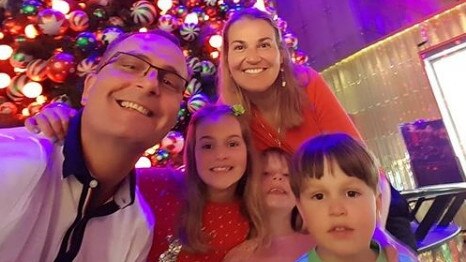 The family poses for a Christmas photo. Tomislav and Katie Perinovic with their children Claire, 7, Anna, 5, and Matthew, 3. Picture: Facebook