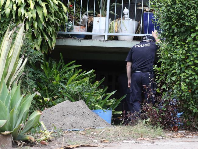 Police will continue to search under an Inala property for evidence relating to the alleged death of Peter Enright. Picture: Annette Dew