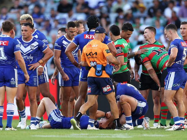 Jacob Preston (ground) returned to the field after suffering a jaw fracture. Picture: Cameron Spencer/Getty Images