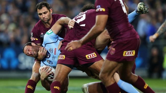 Boyd Cordner gets the Maroon treatment in 2015 State of Origin I. Picture: Brett Costello