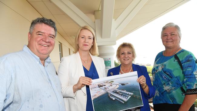 From left, Member for Fong Lim, Mark Monaghan, Deputy NT Chief Minister Nicole Manison, Assistant Minister for Northern Australia Michelle Landry and NT Senator Sam McMahon at Parliament House with one of the five concept designs for Darwin’s $400 million ship lift. Picture: Katrina Bridgeford