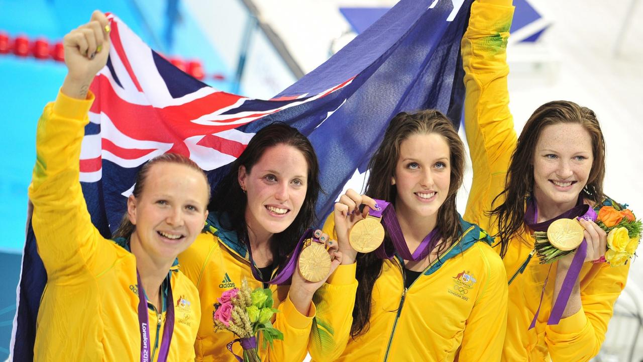 Melanie Schlanger, Alicia Coutts, Brittany Elmslie and Cate Campbell celebrate after winning gold in the women's 4x100m Freestyle Relay in 2012. Photo: EPA/HANNIBAL