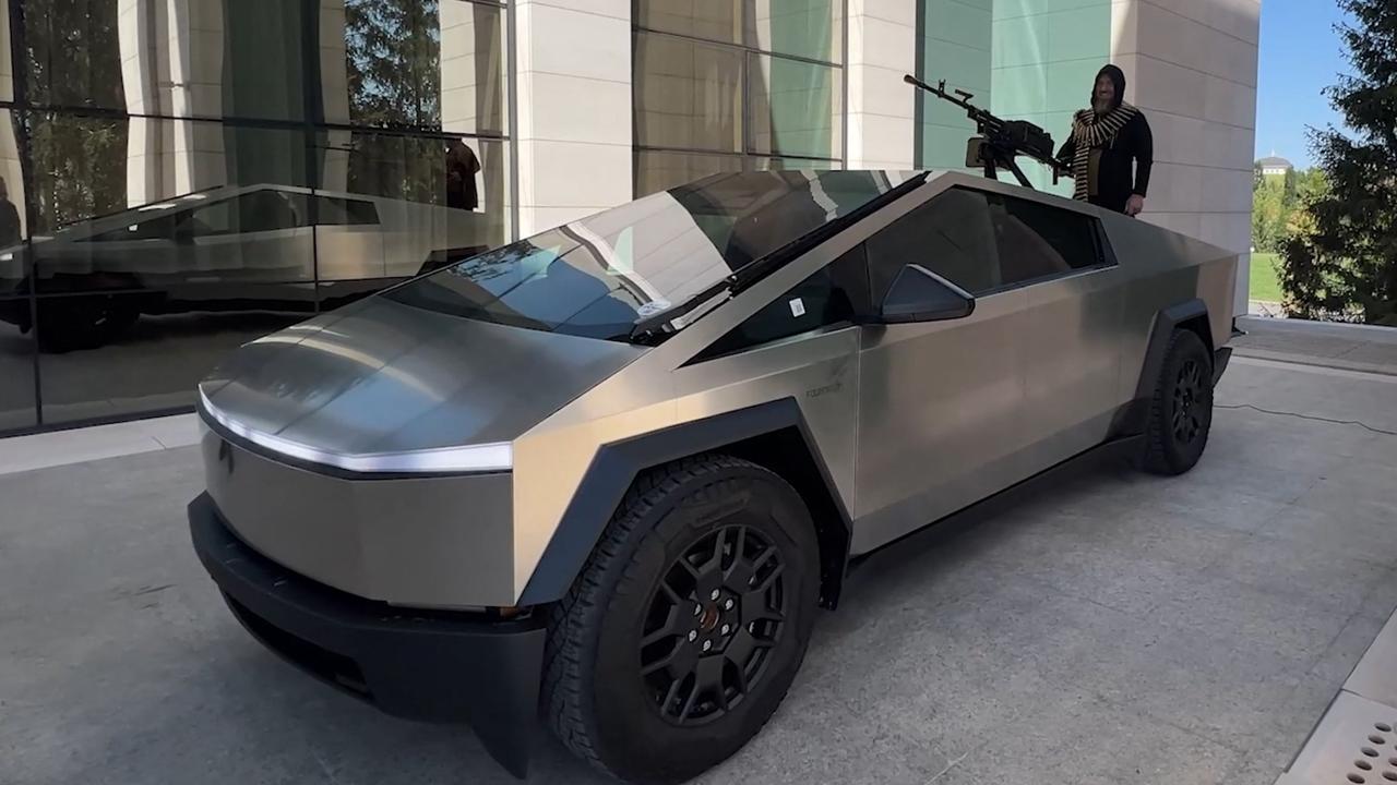 Chechen leader Ramzan Kadyrov standing atop a gun-mounted Tesla Cybertruck in Grozny, Chechnya. Picture: Telegram / @rkadyrov_95 / AFP