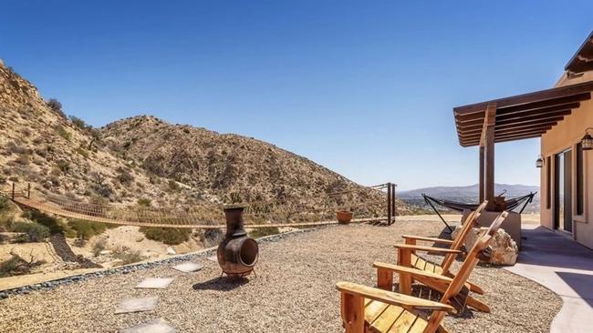 An expansive patio overlooks the mountains at Amber Heard's Yucca Valley, California home. Picture: MLS