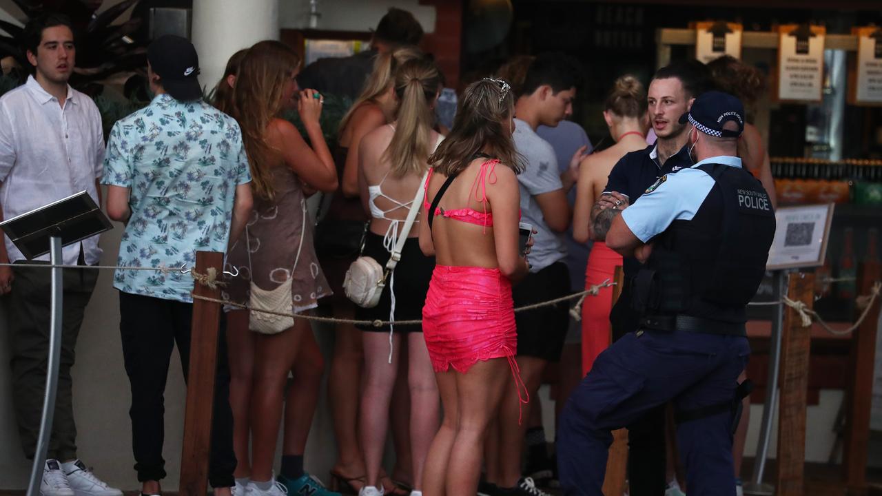 Schoolies line up to get into a Byron Bay hotel. Picture: Jason O'Brien