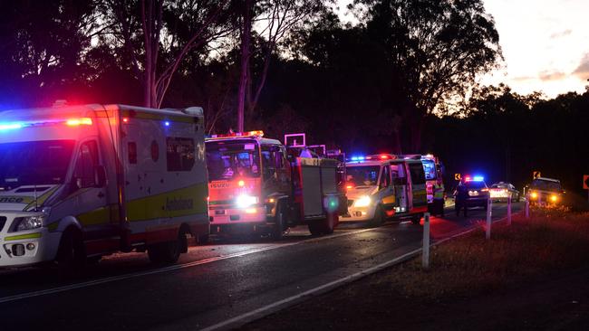 Paramedics attend the single-vehicle fatality that killed Brad and Ebonnie Smith. Photo: Kate Czerny / The Queensland Times