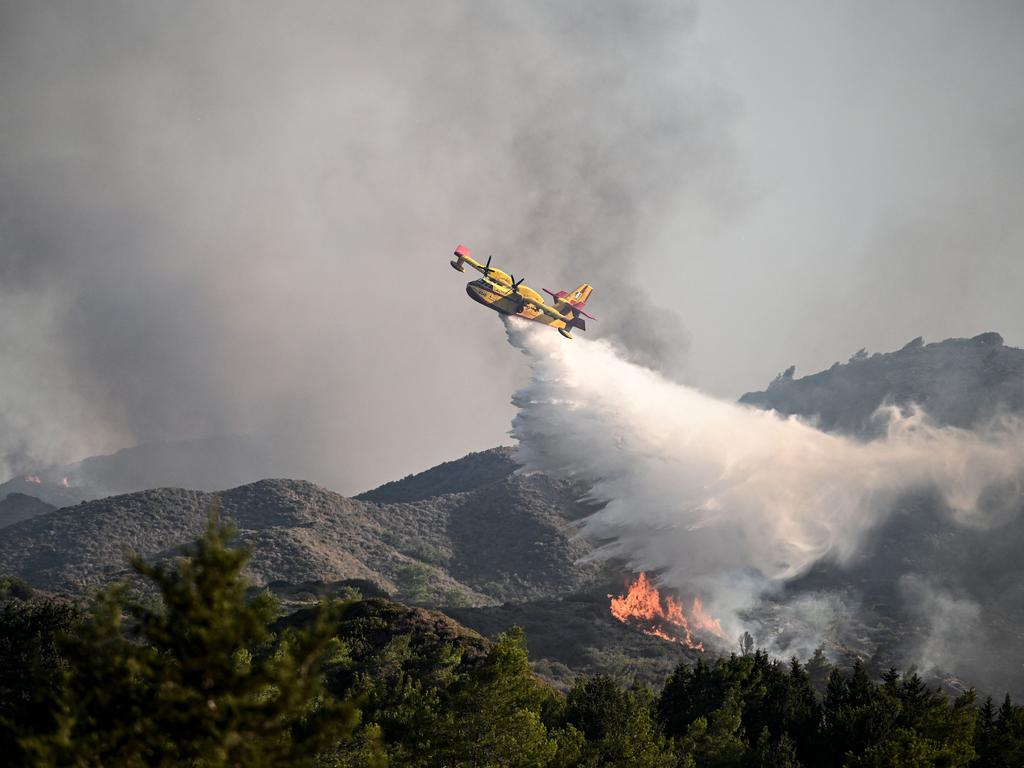 Several firefighting planes have been dispatched since fires began across the country on Sunday. Picture: AFP