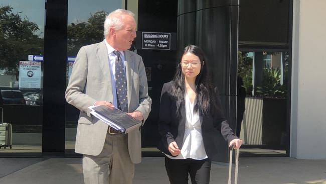 Winnie Huang leaves Southport Court with her barrister Damian Walsh.