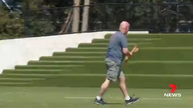 Angry Broncos fans throw wooden spoons on training ground.  Video: Chris Garry/7 News