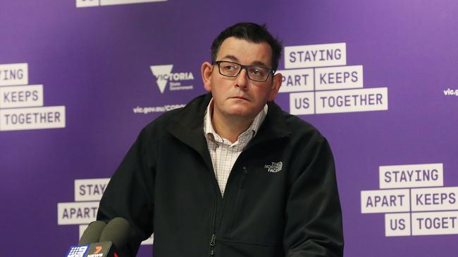 How could we forget the colour purple? Victorian Premier Dan Andrews press conferences during the second wave were in front of this purple media wall. Picture: NCA NewsWire / David Crosling.