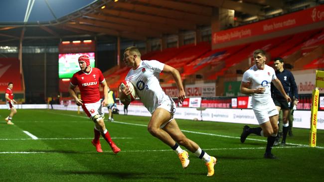 England’s Henry Slade runs in to score their first try during the Autumn Nations Cup match against Wales at Parc y Scarlets in Llanelli