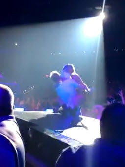 Gaga and Jack fall off the stage.