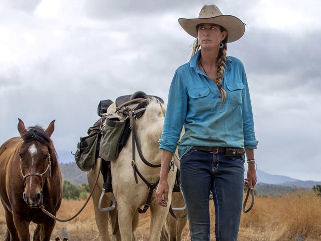 Alienor Le Guevello and her beloved brumbies and dog on the trek. Picture: Cat Vinton