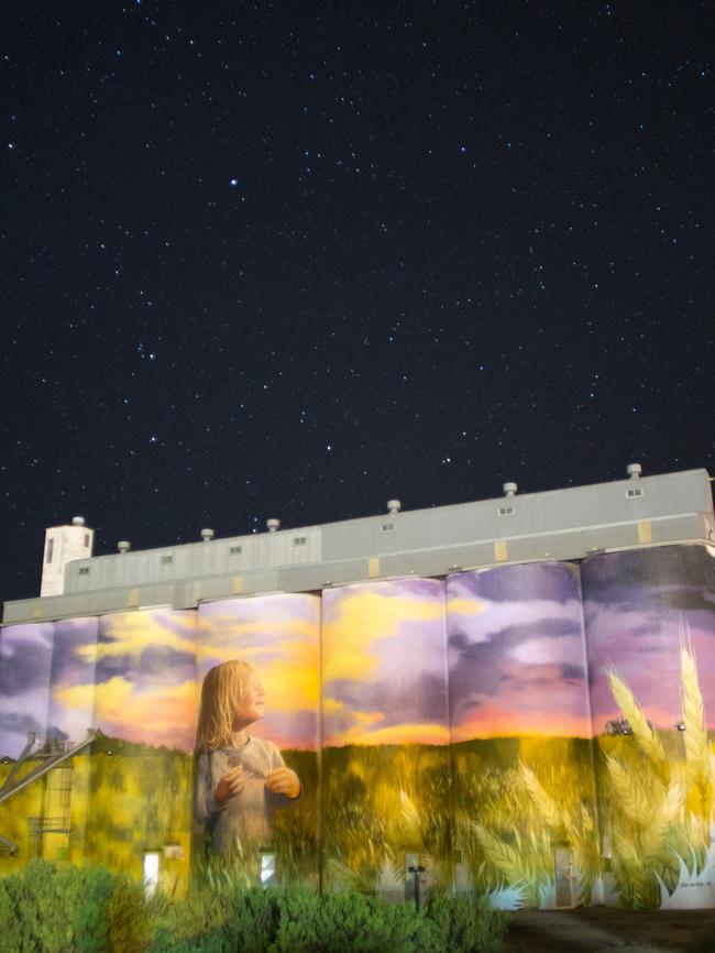 The Kimba silos artwork lit up at night for its official launch. The town hopes to install solar lights to create this affect permanently. Picture: Chris Farrell / <a href="http://fazshot.com.au/" title="fazshot.com.au">http://fazshot.com.au/</a>