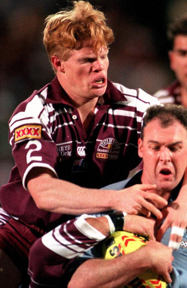 Brett Dallas tackles Paul McGregor in third 1995 State of Origin at Suncorp Stadium.