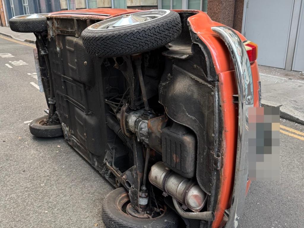 The distressed owner came face-to-face with the underside of their beloved car when they walked down later that morning. Picture: Supplied