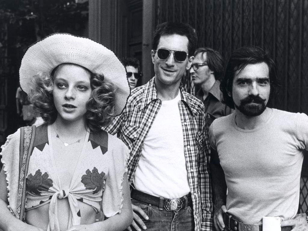 Actors Jodie Foster and Robert De Niro with director Martin Scorsese on the set of Taxi Driver. 