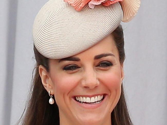 TO GO WITH AFP STORY BY JAMES PHEBY (FILES) In a file picture taken on August 4, 2014, Prince William, Duke of Cambridge and Catherine, Duchess of Cambridge attend at Le Memorial Interallie in Liege, Belgium, commemorations marking 100 years since the invasion of Belgium by Germany at the start of World War I. The birth of Prince William and his wife Kate's second baby will cap a momentous four years for Britain's golden couple, completing their journey from student sweethearts to regal domesticity. From the moment William drove his new family home from hospital after the birth of Prince George in 2013, his hands-on approach has been in stark contrast to previous generations of royal fathers. AFP PHOTO / POOL / Chris Jackson